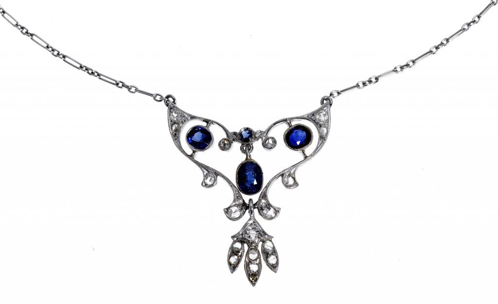 Appraisal: A SAPPHIRE AND DIAMOND OPENWORK PENDANT the central sapphire drop