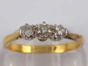 Appraisal: A yellow metal tests carat gold diamond three stone ring