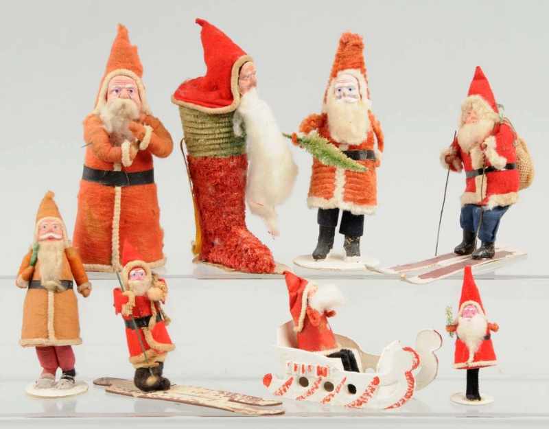 Appraisal: Lot of Japanese Santas Description Two on skis and one