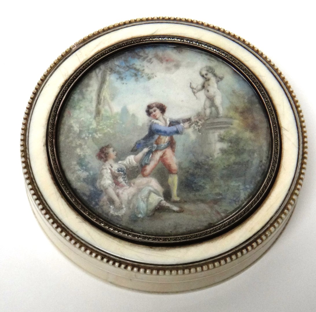 Appraisal: A circular ivory box and cover probably French glazed with