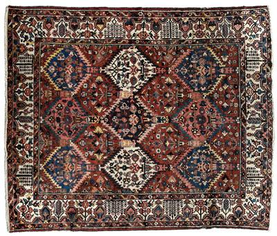 Appraisal: Bakhtiari rug repeating stepped diamonds on a brick red field