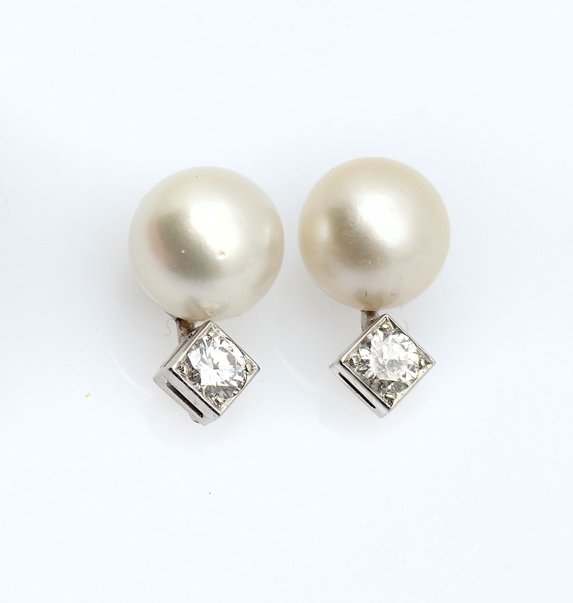 Appraisal: K ART DECO PEARL DIAMOND STUDS K white gold pearl