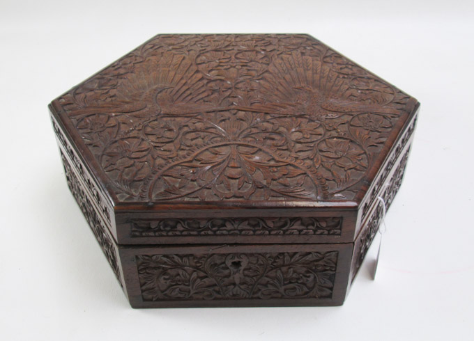 Appraisal: CHINESE CARVED WOOD JEWELRY BOX hexagonal form with hinged lid