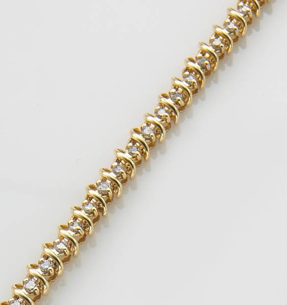 Appraisal: A diamond and k gold bracelet estimated total diamond weight