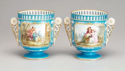 Appraisal: Pair Sevres style vases hand painted reserves with lovers blue