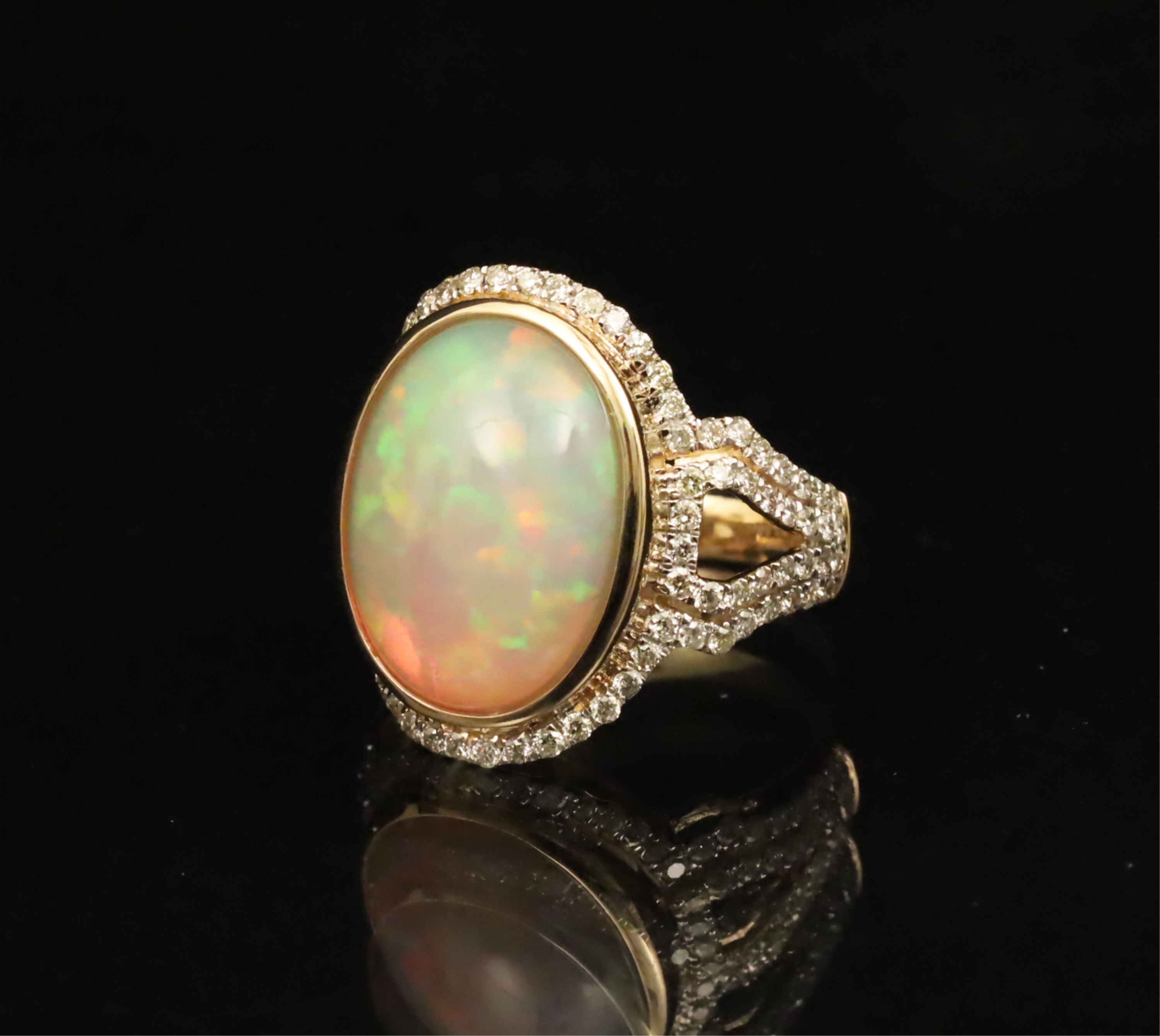 Appraisal: K LADY'S DIAMOND AND OPAL RING K yellow gold lady's