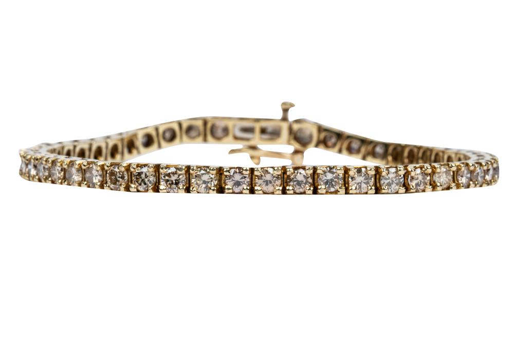 Appraisal: KARAT YELLOW GOLD DIAMOND TENNIS BRACELETcontaining full cut diamonds P-Q-R-Light