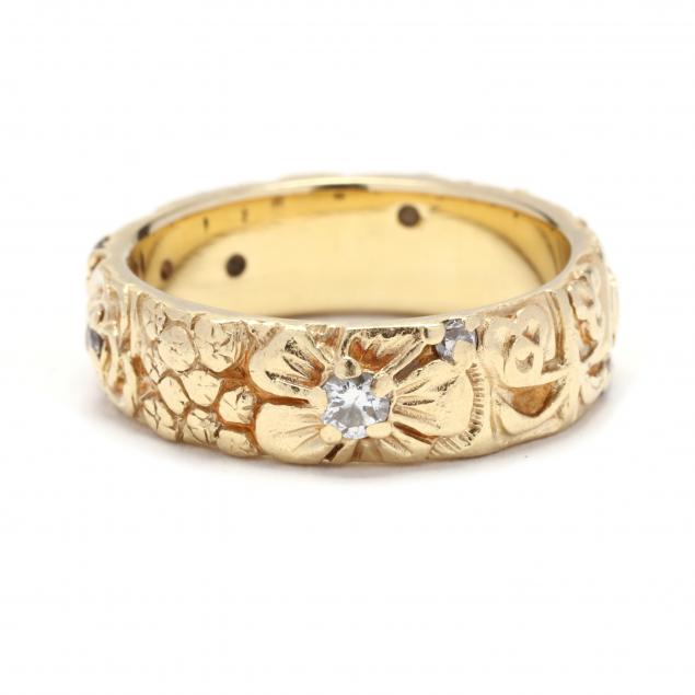 Appraisal: GOLD AND DIAMOND RING KEITH BELLES The gold band with