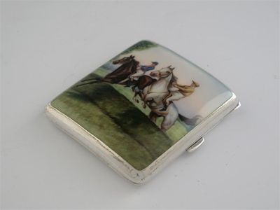 Appraisal: A Continental cigarette case enamelled with two racehorses jumping a