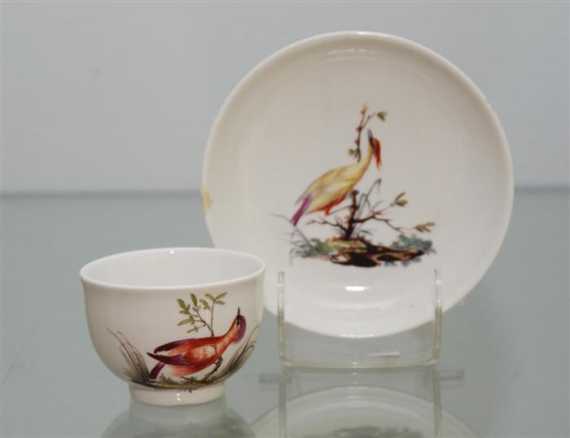 Appraisal: CUP AND SAUCER Fulda second half of th century With