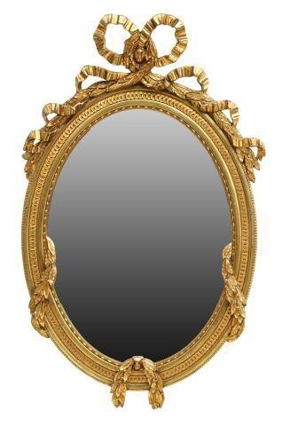 Appraisal: Louis XVI style giltwood hanging mirror th c having applied