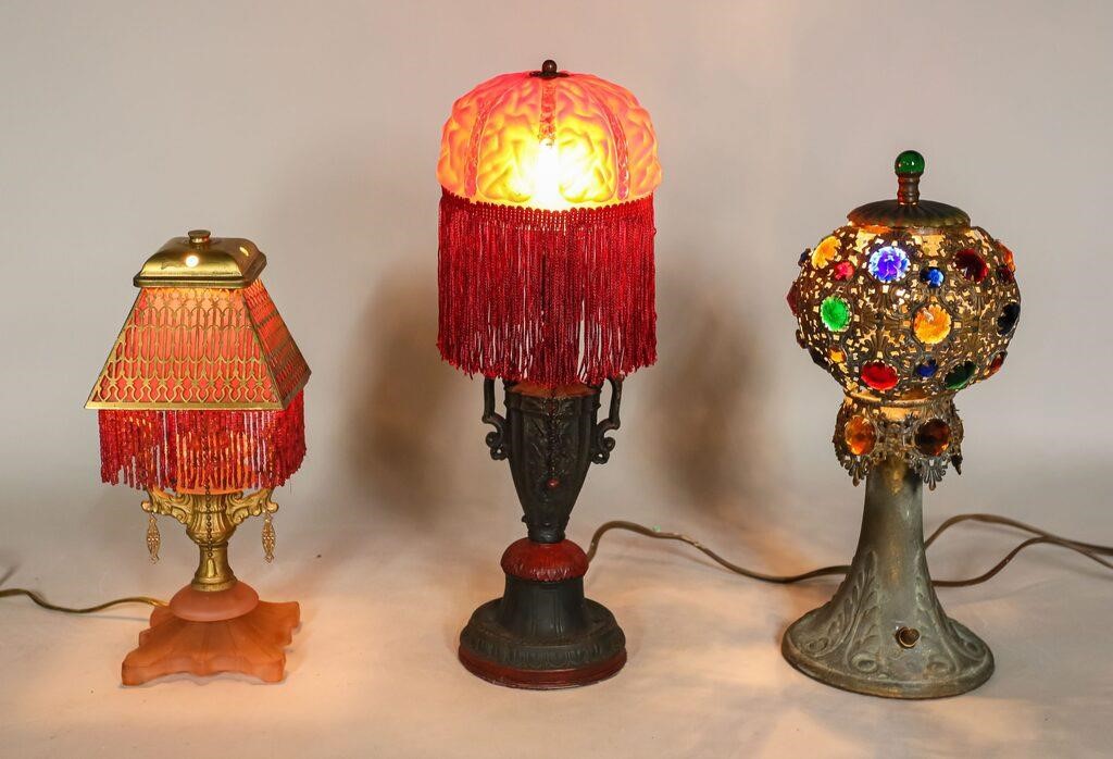 Appraisal: BOUDOIR LAMPS boudoir lamps Pink glass with beaded brass overlay