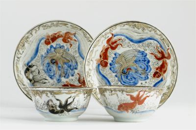 Appraisal: A pair of Chinese eggshell porcelain teabowls and saucers painted