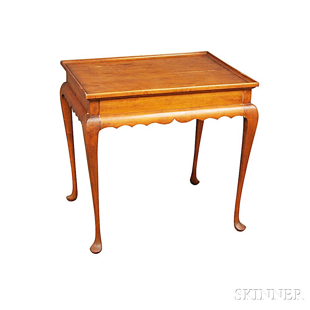 Appraisal: Queen Anne-style Maple Tea Table the dished rectangular top over