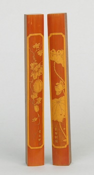 Appraisal: A Pair of Scroll Weights Chinese Heavy elongated form bars