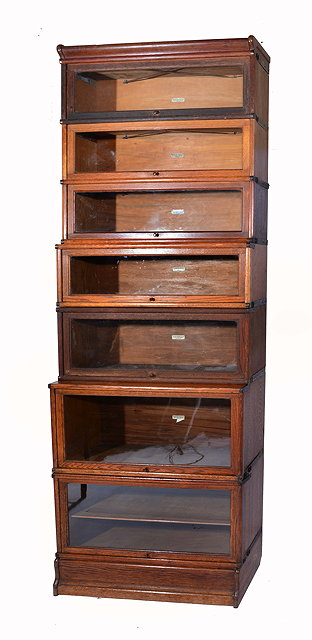 Appraisal: A SEVEN SECTION OAK GLOBE WERNICKE BOOKCASE cm wide