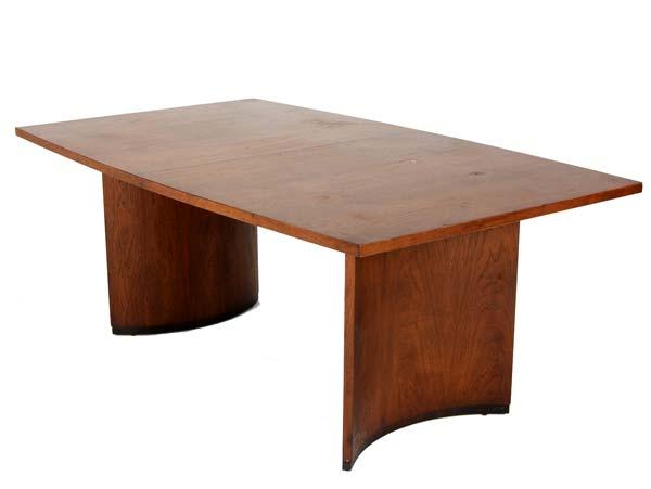 Appraisal: MODERN Dining table on curved panel legs with two leaves