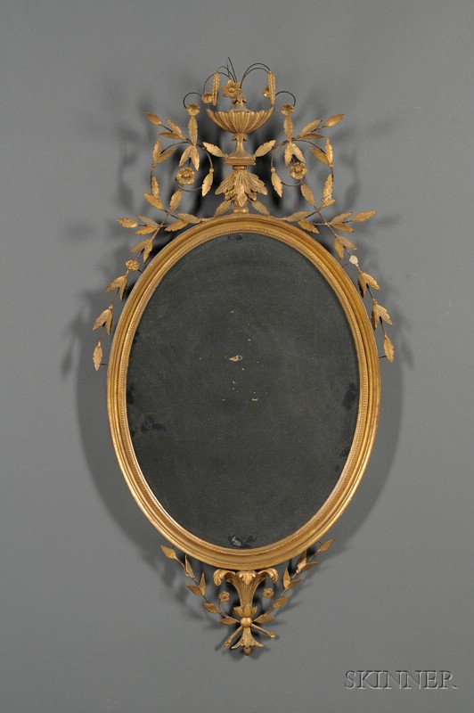 Appraisal: George III Style Giltwood and Composition Mirror of oval form