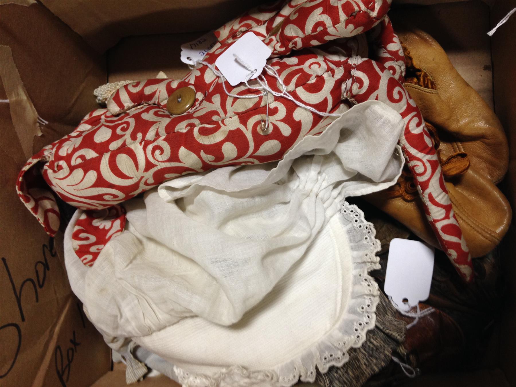 Appraisal: DOLL CLOTHING Late th-early th century This lot includes some