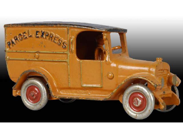 Appraisal: Scarce Cast Iron Dent Panel Truck Toy Description Orange with