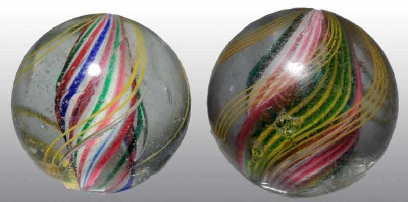 Appraisal: Lot of Divided Core Swirl Marbles Description Largest has alternating