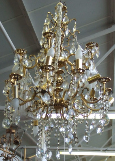 Appraisal: A gilt brass fifteen branch chandelier th century hung with