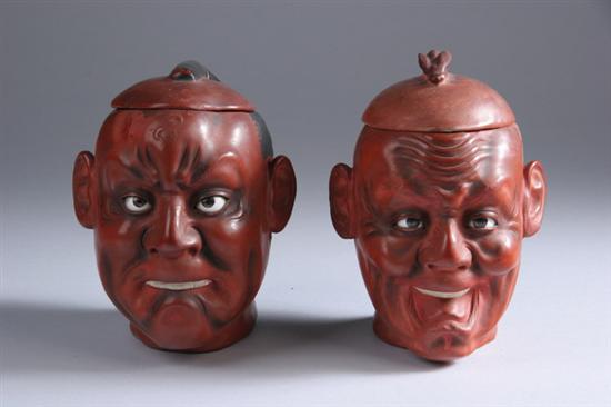 Appraisal: TWO JAPANESE LACQUER HUMIDORS Human heads with glass eyes -