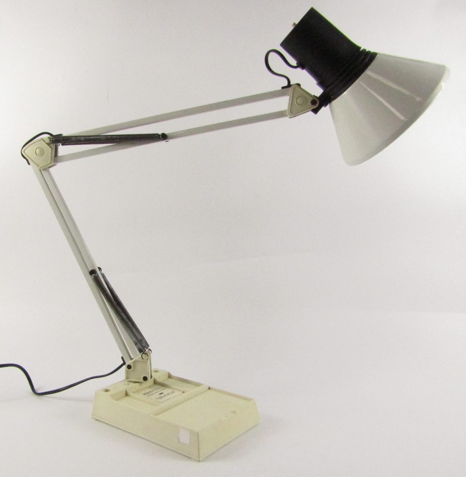 Appraisal: A mid thC white anglepoise table lamp on a cream