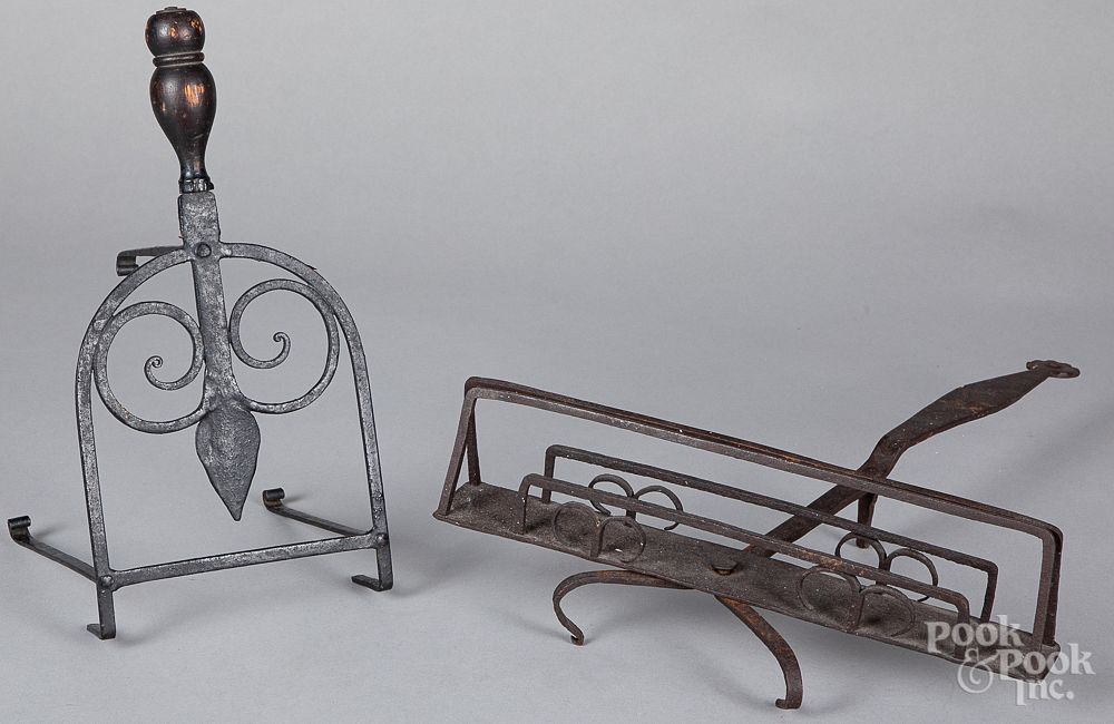 Appraisal: Wrought iron fireplace toaster and trivet th c Wrought iron