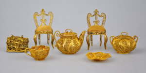 Appraisal: A small collection of gilt metal filigree miniature items comprising