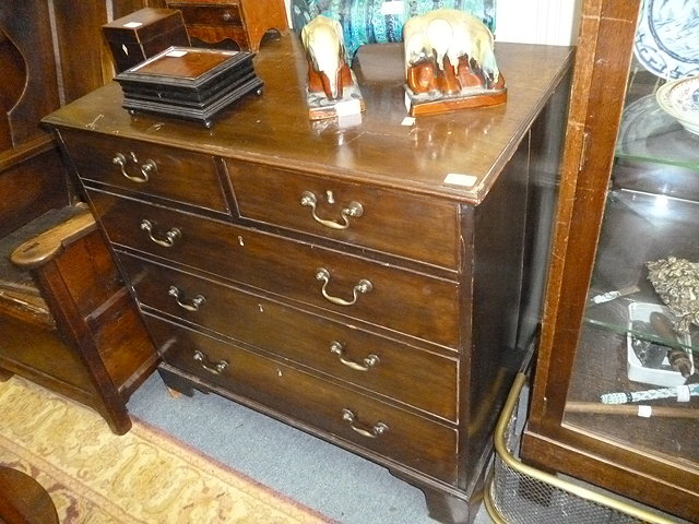 Appraisal: A GEORGIAN MAHOGANY CHEST of two short and three long