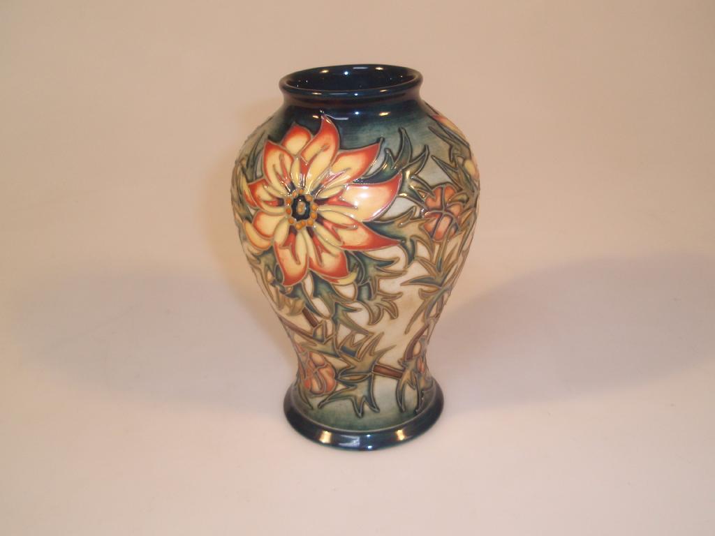 Appraisal: Moorcroft Modern a baluster vase decorated with hellebore painters mark