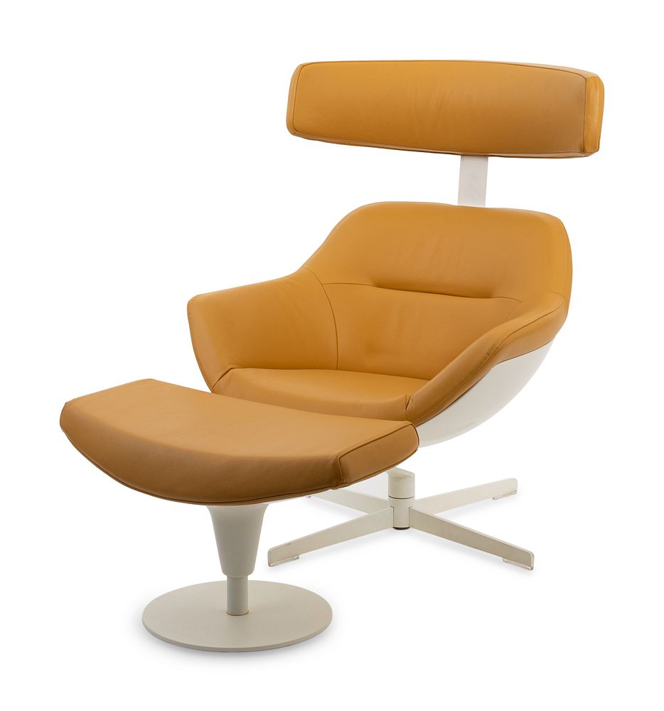 Appraisal: A Post Modern Leather Upholstered Lounge Chair and Ottoman Chair