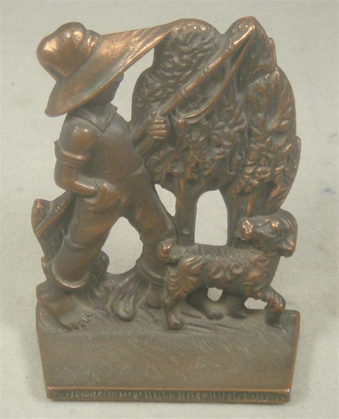 Appraisal: Cast iron doorstop bronze colored young boy with fishing pole