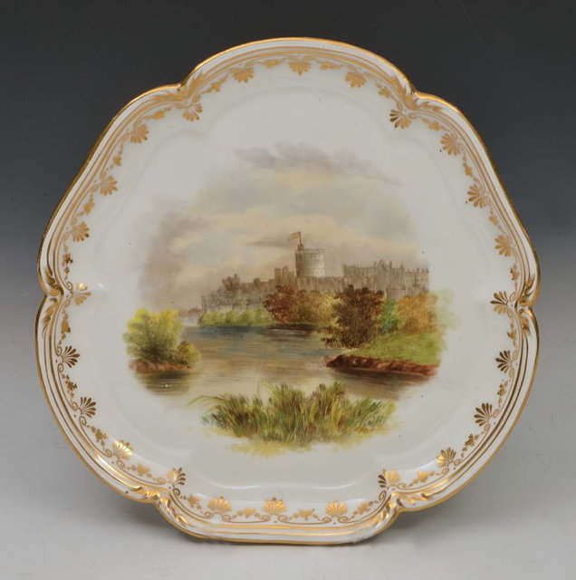 Appraisal: A MINTON SHAPED TRIANGULAR LOW STAND painted with a view