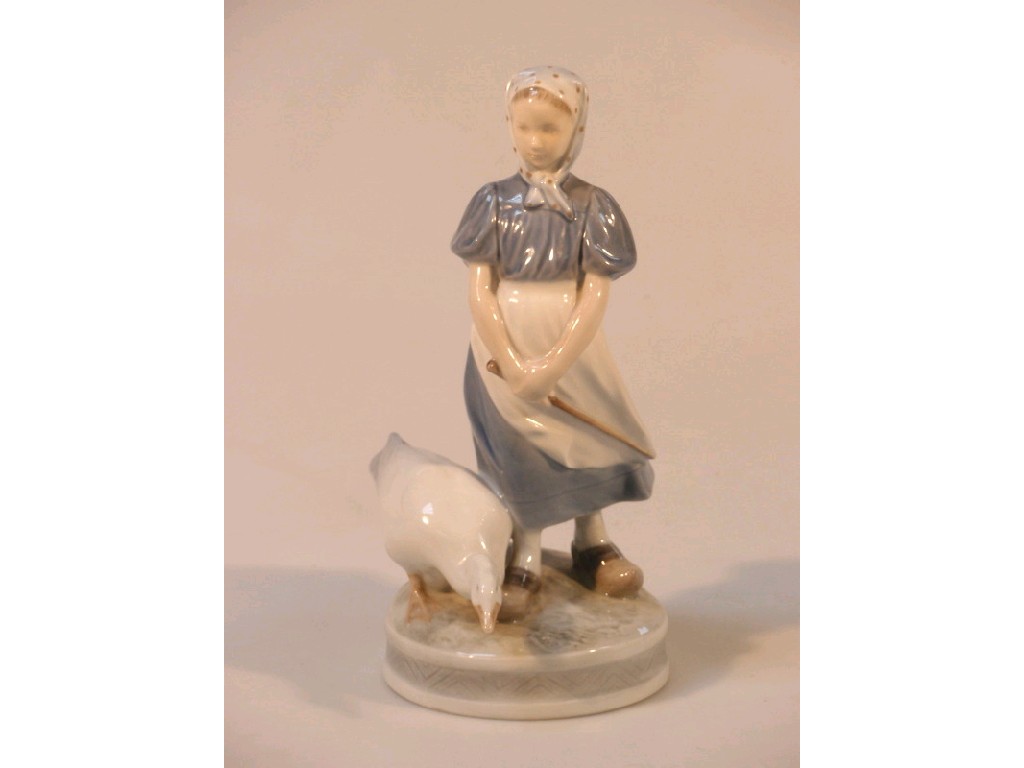 Appraisal: A Royal Copenhagen figure of a goose girl cm