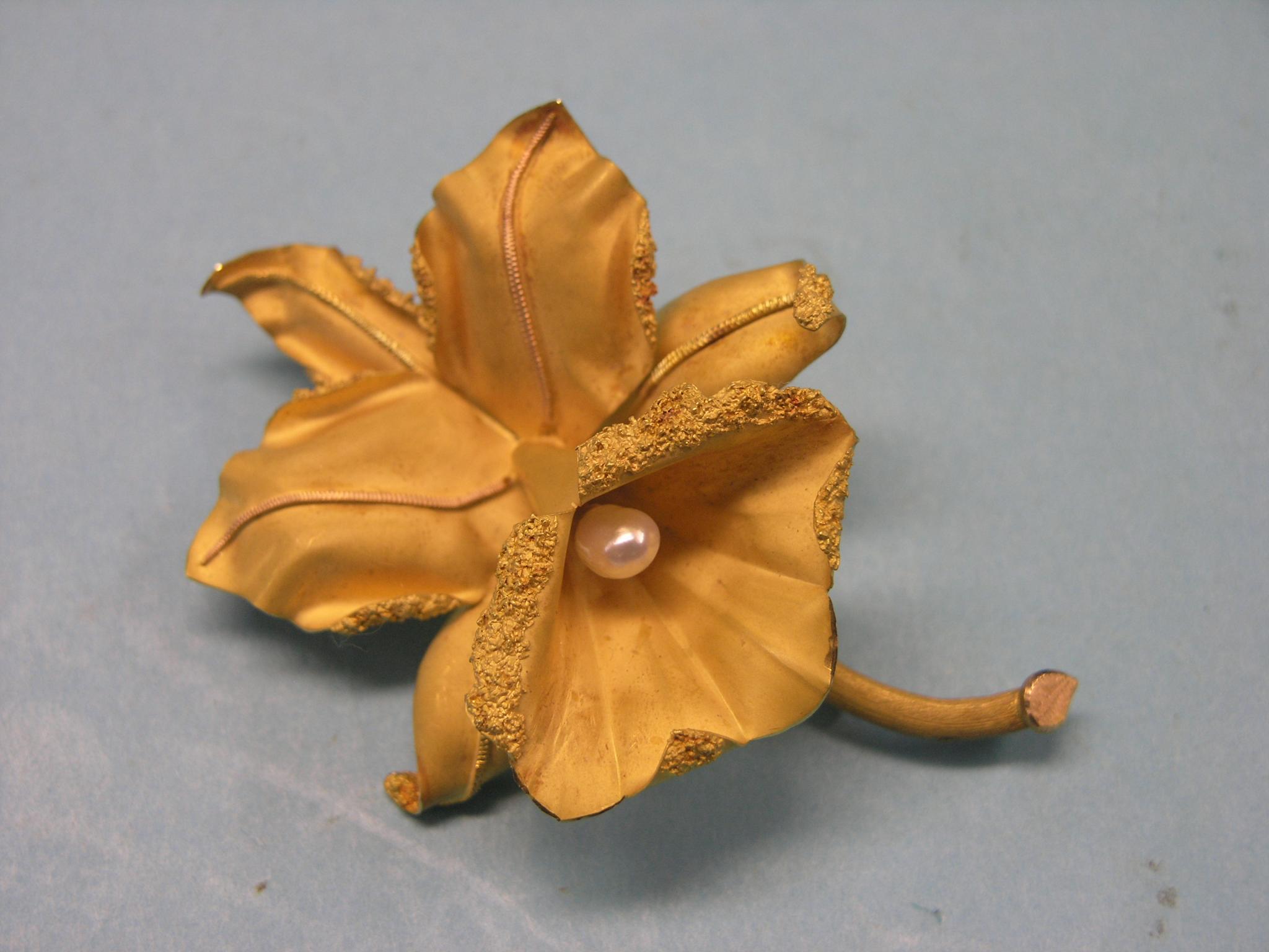 Appraisal: A yellow metal orchid brooch set single pearl grams gross