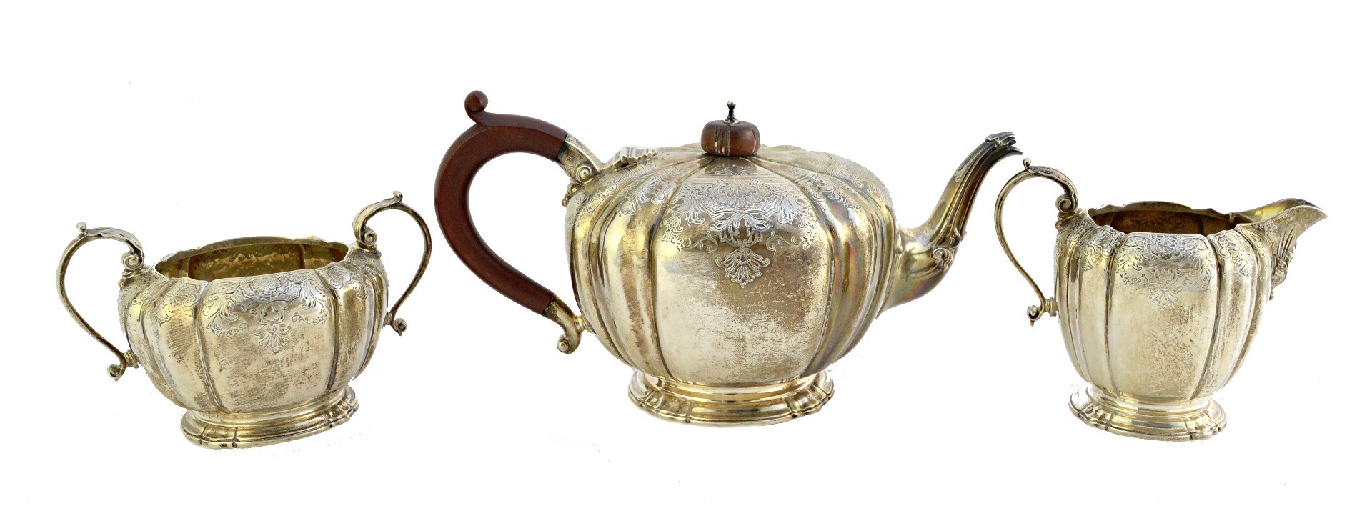 Appraisal: A silver three piece tea set comprising a teapot a