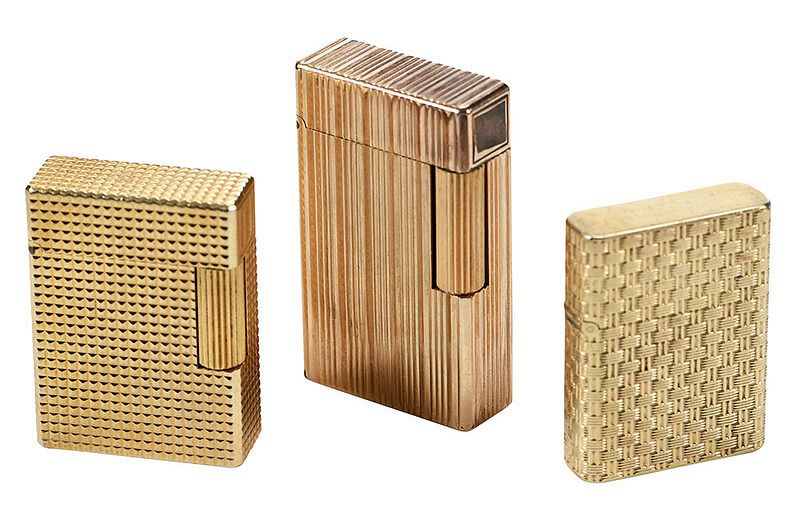 Appraisal: Three Retro Lighters one basket weave design stamped kt yellow