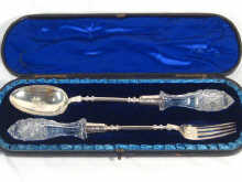 Appraisal: A pair of Victorian silver salad servers hallmarked London with