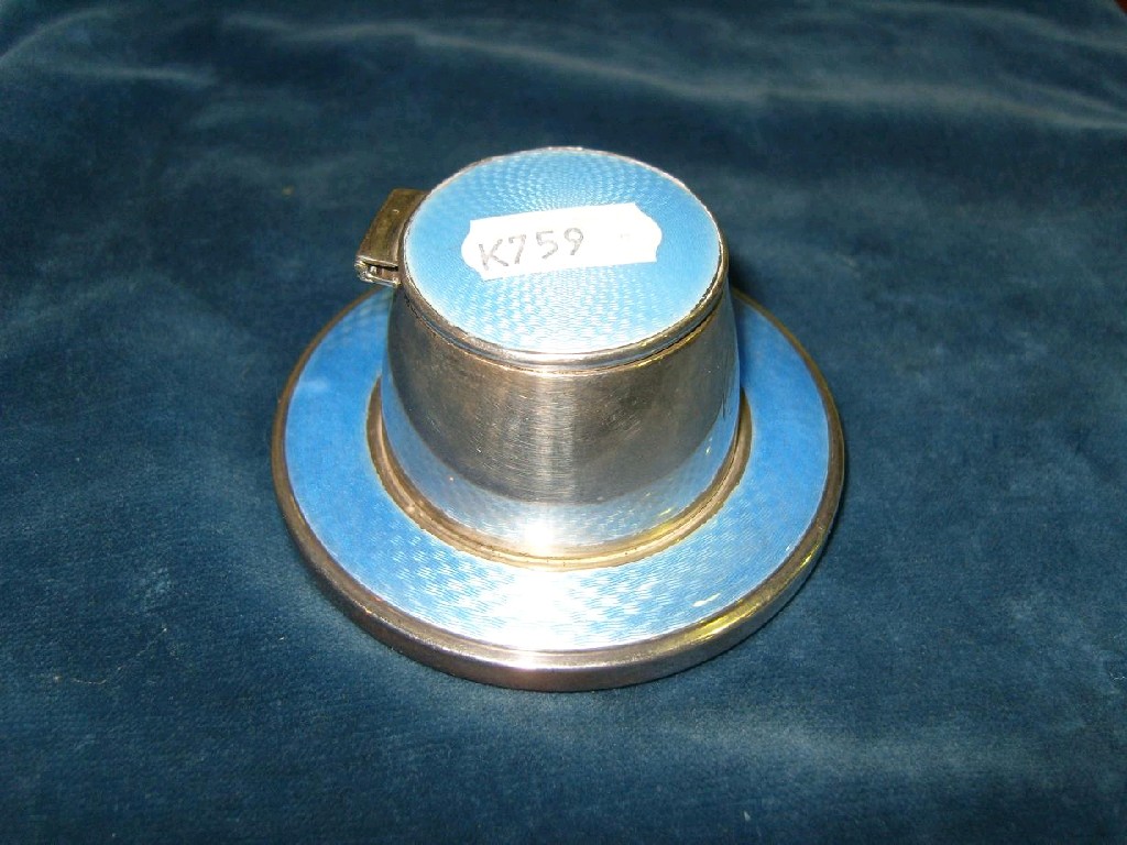 Appraisal: A silver and blue enamelled inkwell with hinged cover and