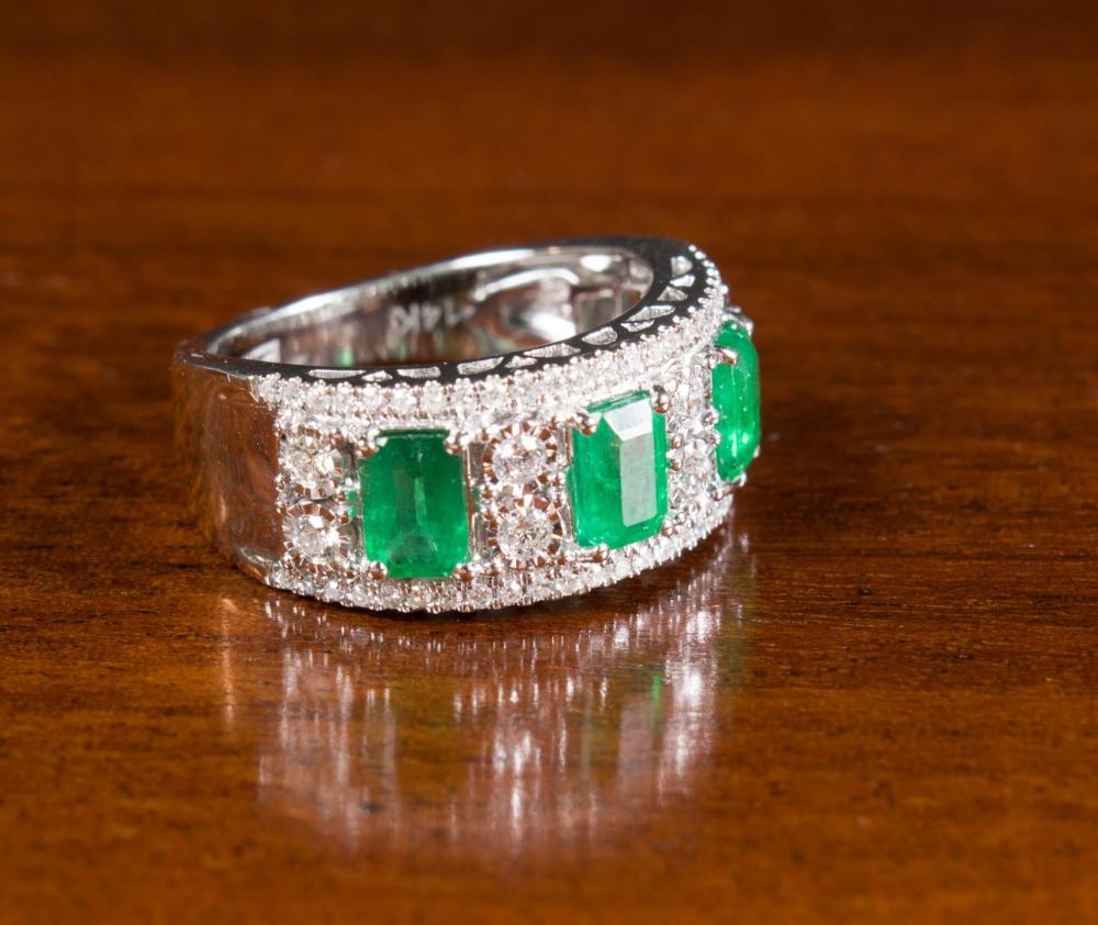 Appraisal: EMERALD DIAMOND AND FOURTEEN KARAT GOLD EFFY RING The k