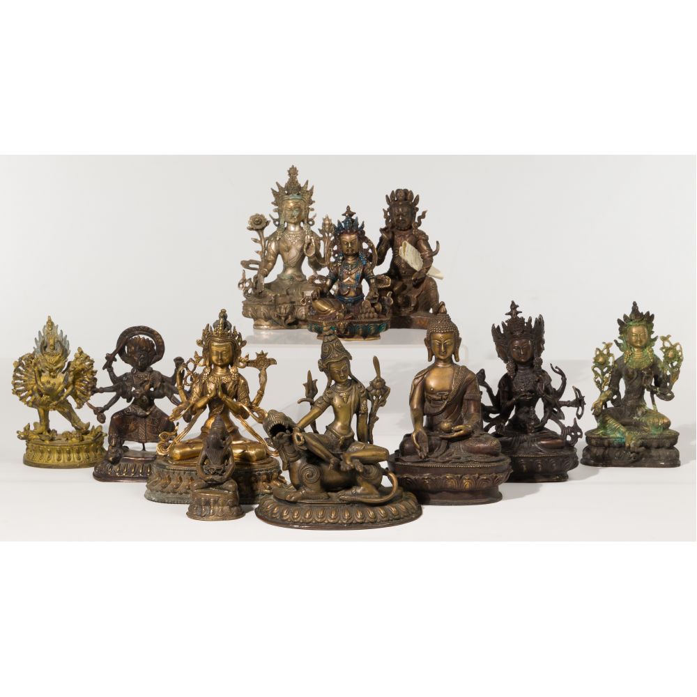 Appraisal: TIBETAN STYLE BUDDHA ASSORTMENT items some in gilded bronze silver-tone