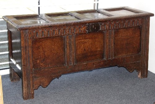 Appraisal: An th Century oak coffer the hinged lid above a