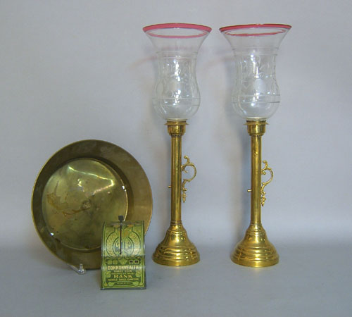 Appraisal: Pair of brass candlesticks th c with etched glass shades