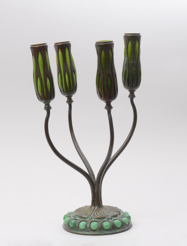 Appraisal: TIFFANY STUDIOS PATINATED BRONZE AND FAVRILE GLASS FOUR-LIGHT CANDELABRUM Stamped