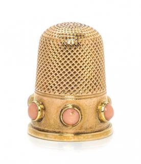 Appraisal: An English Yellow Gold and Coral Thimble the knurled top