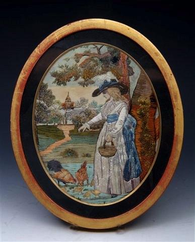 Appraisal: A GEORGIAN OVAL SILK WORK PICTURE of a lady feeding