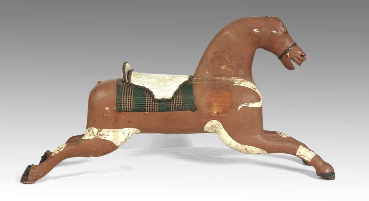 Appraisal: ANTIQUE CHILD'S CAROUSEL HORSE Primitive carved and painted wood stationary