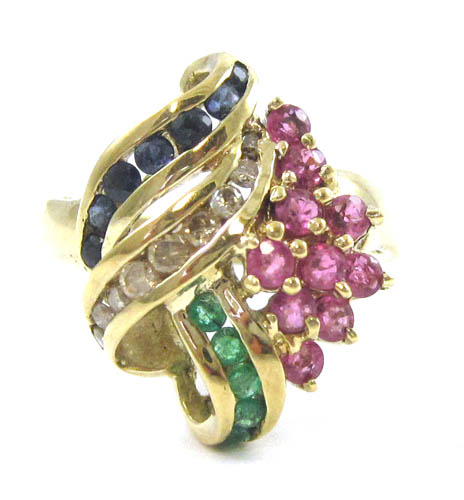 Appraisal: SAPPHIRE RUBY EMERALD AND DIAMOND RING The k yellow gold